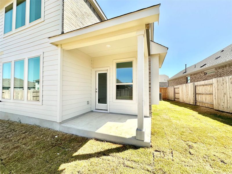 Doorway to property with a patio area Doorway to property with a patio area