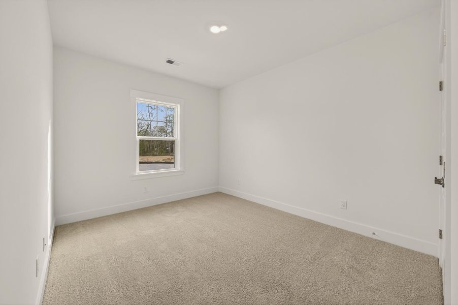 Spacious, unfurnished interior of a new home in Indigo Place, North Charleston (Image 29).