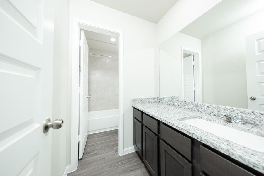 Furnished interior view inside a new home in Ridgeland Hills, Willis (Image 5).