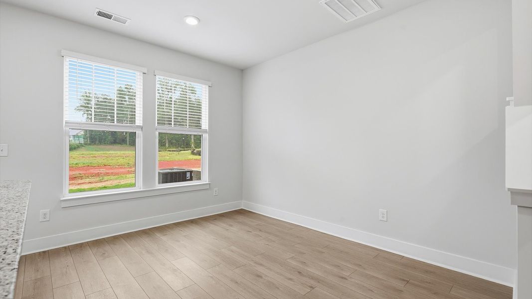 Inviting breakfast area with a seamless connection to the kitchen for everyday living in Lyman, SC Inviting breakfast area with a seamless connection to the kitchen for everyday living in Lyman, SC