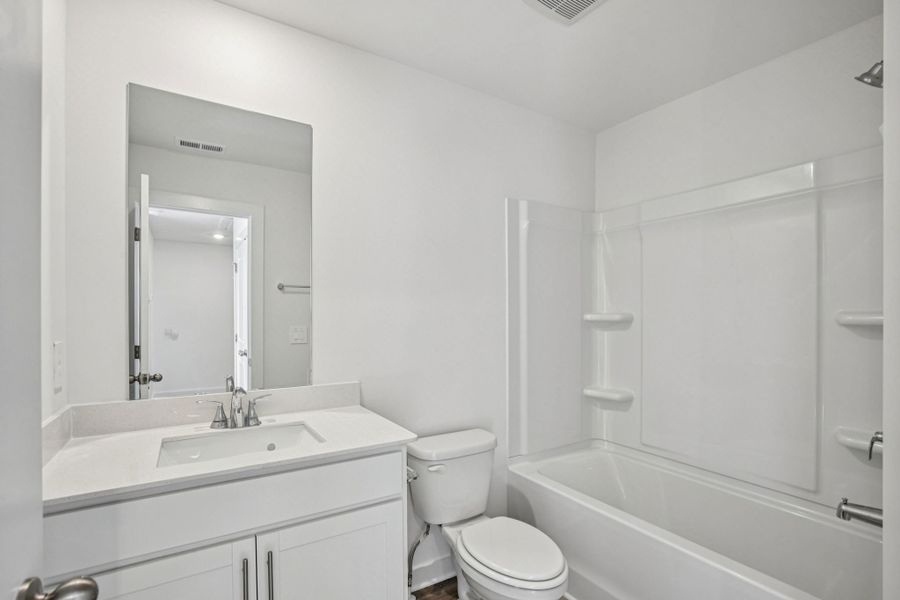 Furnished interior view inside a new home in Greystone - Highland Townhomes, Smyrna (Image 8).