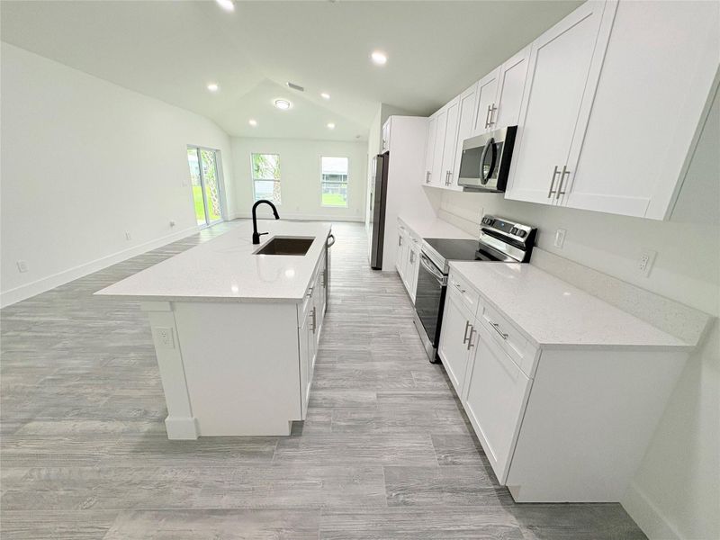 Furnished interior view inside a new home in , Okeechobee (Image 6).