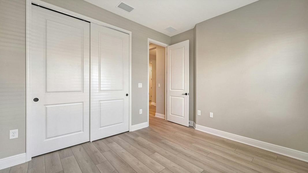 Spacious, unfurnished interior of a new home in Windward Real Estate and Homes for Sale in Sarasota, FL - Neal Communities, Lakewood Ranch (Image 43).