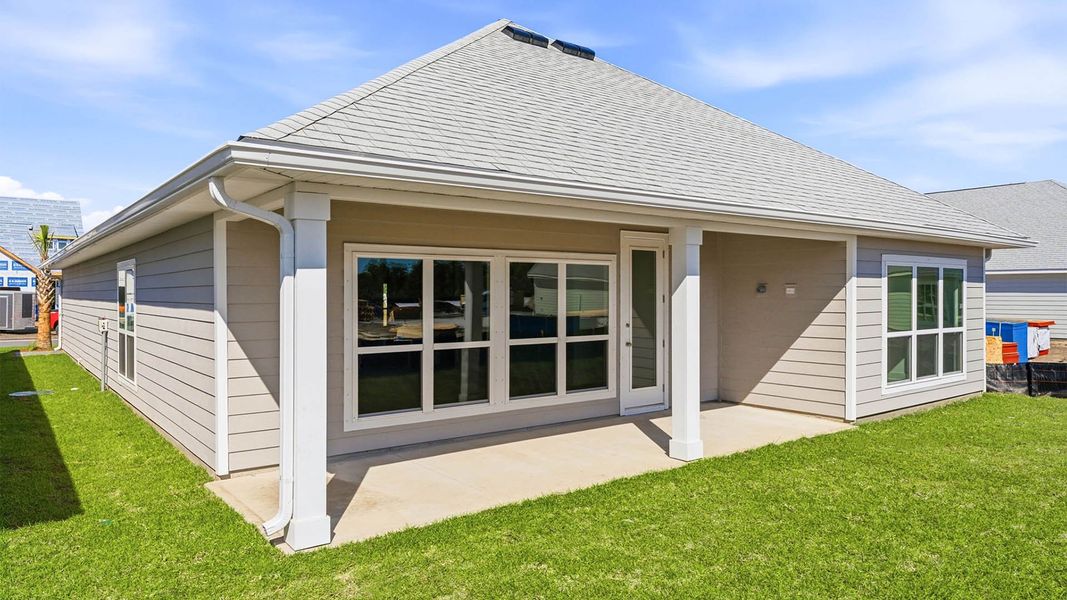 Exterior details and patio area of a home in WindMark Beach, Port Saint Joe (Image 4).