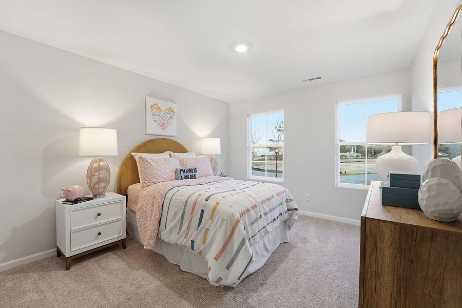 Representative furnished interior of a home built from the Telfair - Genesis Value Collection by Mungo Homes in Piper Creek, Newton (Image 9).