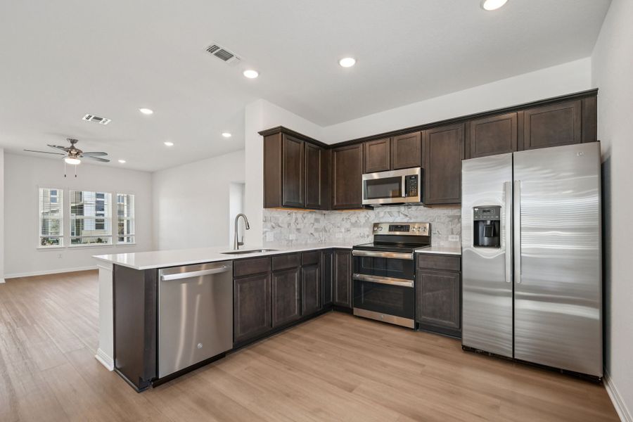 Representative furnished interior of a home built from the Andrews by Pacesetter Homes in Blanco Vista, San Marcos (Image 6).