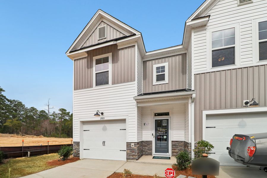 Representative exterior photo of a completed home built from the East Wind by Great Southern Homes in Victory Woods, Columbia, SC (Image 45). Representative exterior photo of a completed home built from the East Wind by Great Southern Homes in Victory Woods, Columbia, SC (Image 45).