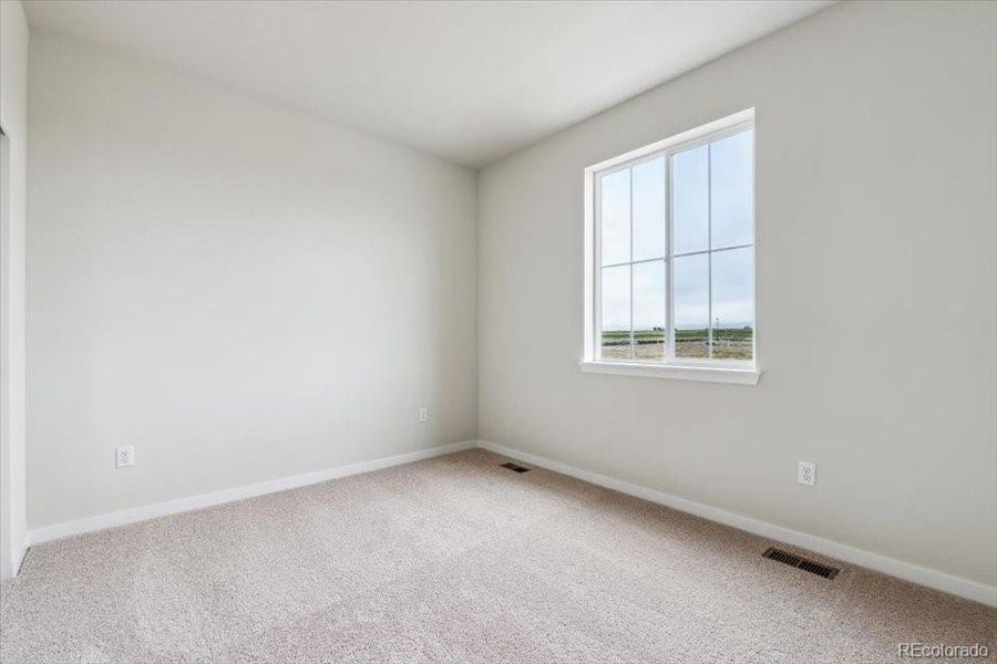 Spacious, unfurnished interior of a new home in Red Barn Meadows, Mead (Image 19).