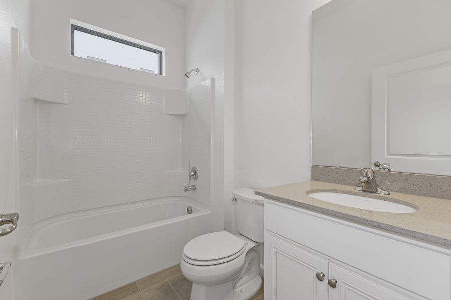 Representative furnished interior of a home built from the Aquamarine by Park Square Residential in Paradiso Grande, Orlando (Image 7).