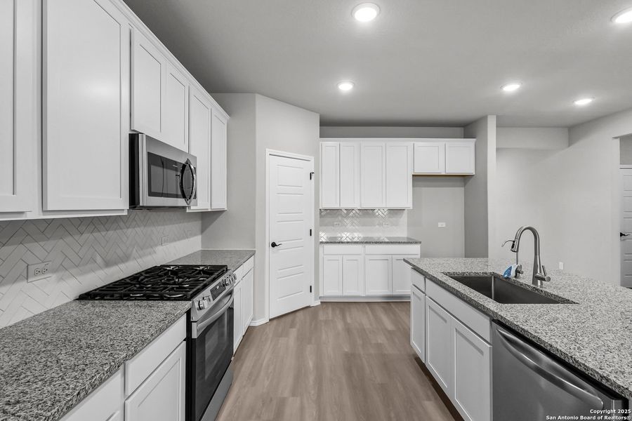 Furnished interior view inside a new home in Comanche Ridge, San Antonio (Image 29). Furnished interior view inside a new home in Comanche Ridge, San Antonio (Image 29).