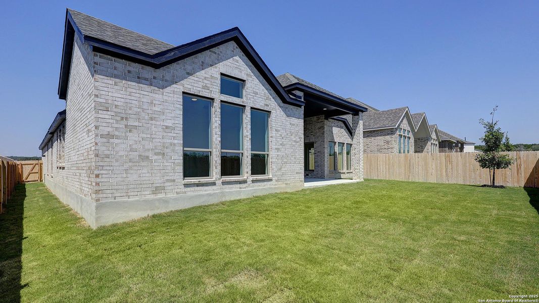 Front exterior of a new home in Kallison Ranch 60', San Antonio, TX, highlighting curb appeal (Image 22).
