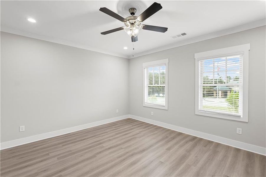 Spacious, unfurnished interior of a new home in Devin's Shire - A Kennesaw Tradition, Kennesaw (Image 36).
