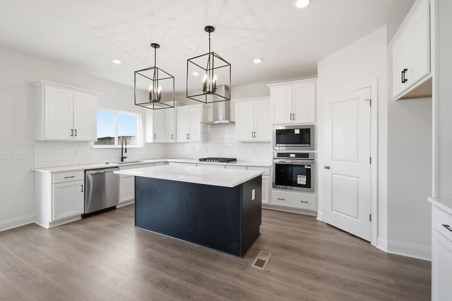 Furnished interior view inside a new home in McCain's Station, Gallatin (Image 8).