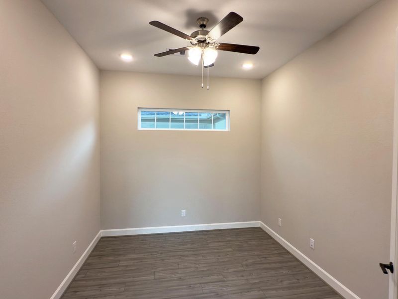 The Portico's flex room provides a versatile space that can be customized to suit your lifestyle, whether as a home office, craft room, or additional living area. *Image depicts home as-is.