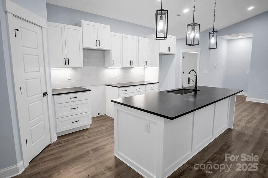 Furnished interior view inside a new home in , Vale (Image 6). Furnished interior view inside a new home in , Vale (Image 6).