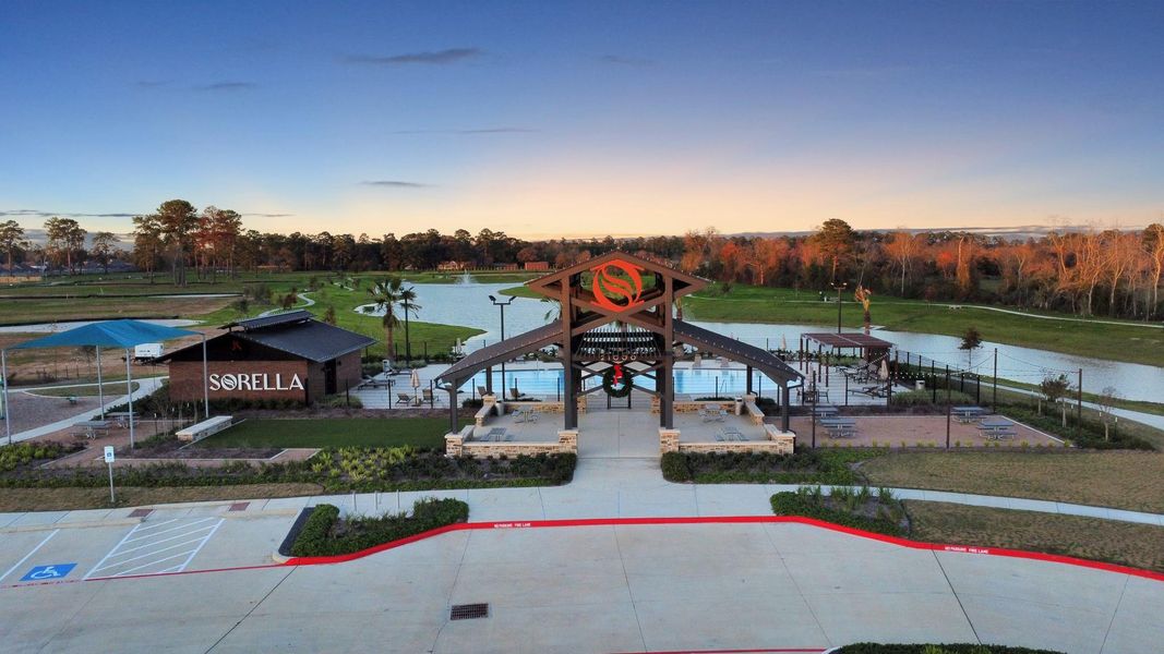 The central hub for community gatherings, featuring an open-air pavilion (right) ideal for events, parties, and family cookouts.