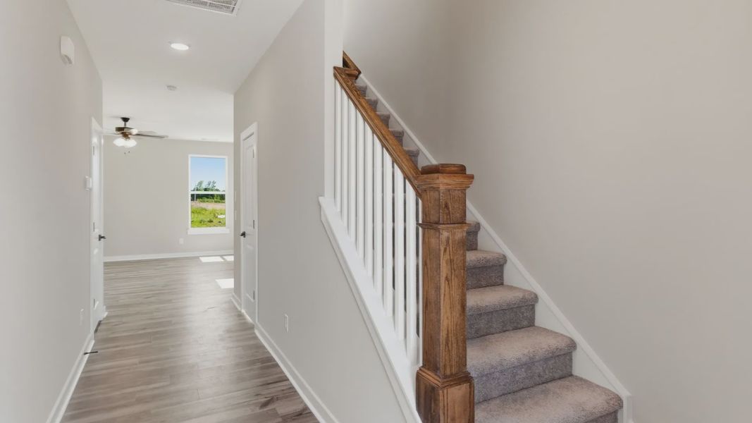 Hallway with access to stairs