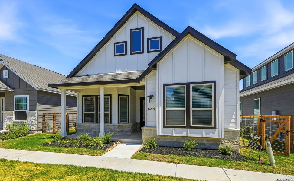Front exterior of a new home in The Crossvine, Schertz, TX, highlighting curb appeal (Image 23).