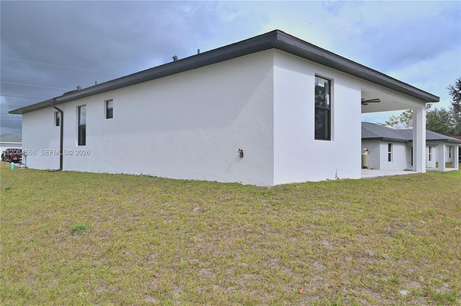 Exterior details and patio area of a home in , Lehigh Acres (Image 4). Exterior details and patio area of a home in , Lehigh Acres (Image 4).