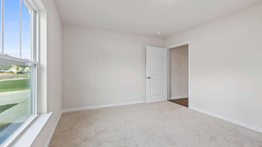 Representative unfurnished interior of a home built from the Macon by D.R. Horton in Bentley Park, Greenwood (Image 19).