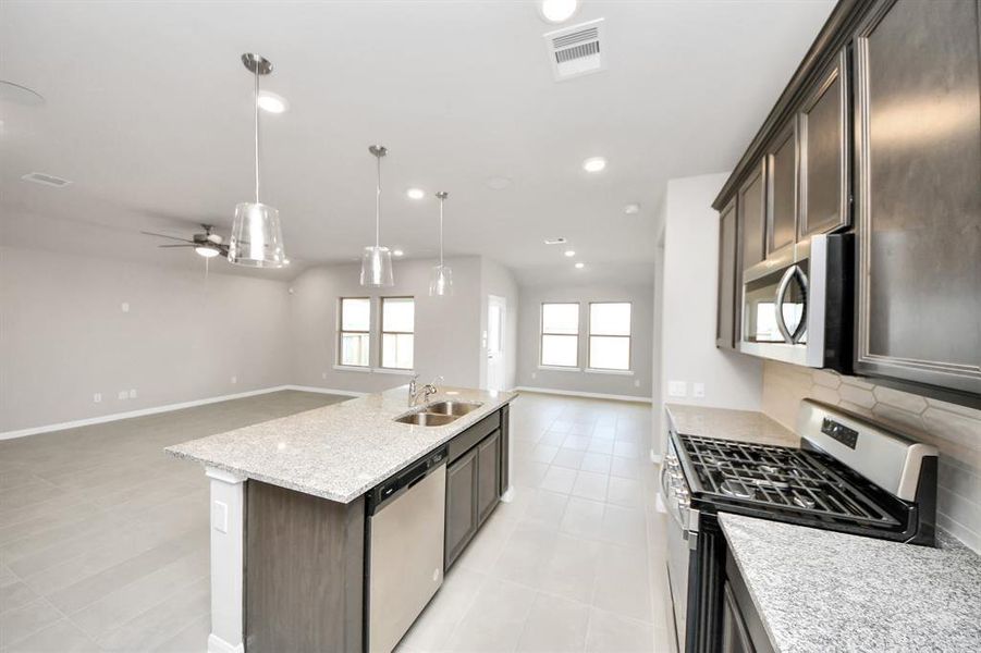 Furnished interior view inside a new home in Sweetgrass Village, Crosby (Image 6).