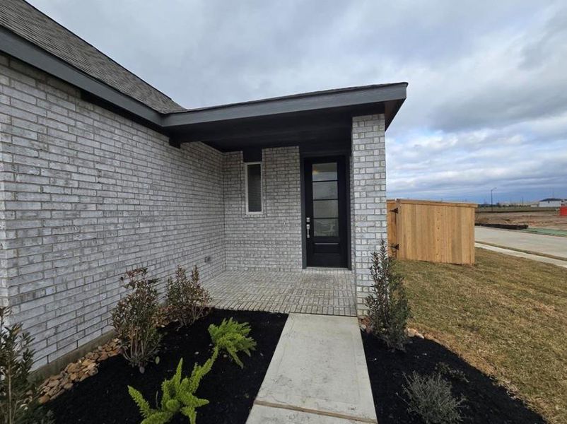 Exterior details and patio area of a home in Synova: Avante Collection, Crosby (Image 3).