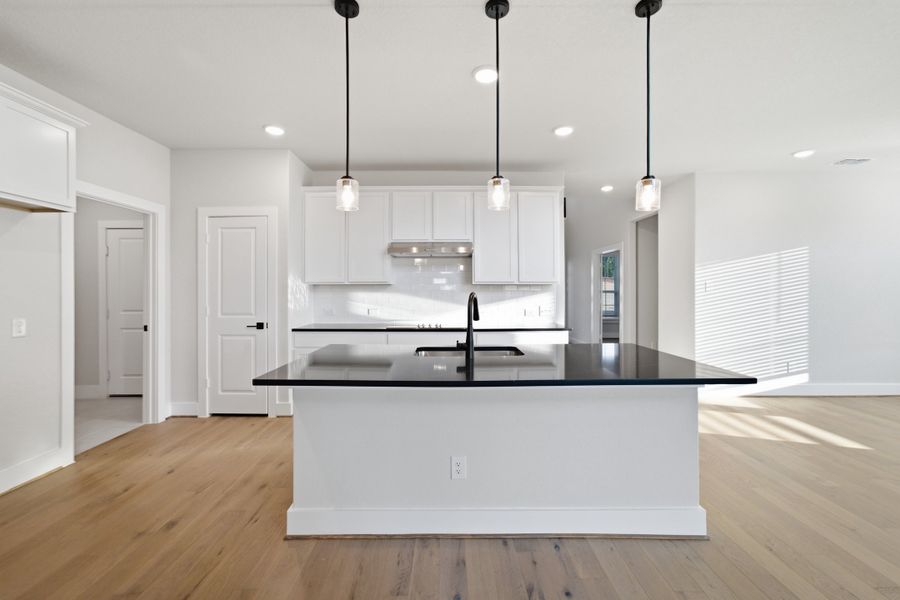 Furnished interior view inside a new home in The Woodlands at Medina Hills, Mico (Image 15).