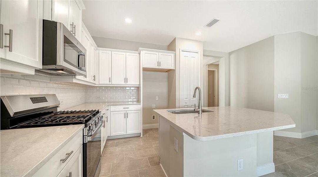 Furnished interior view inside a new home in Vicenza Real Estate and Homes for Sale in North Venice, FL - Neal Communities, Nokomis (Image 6).