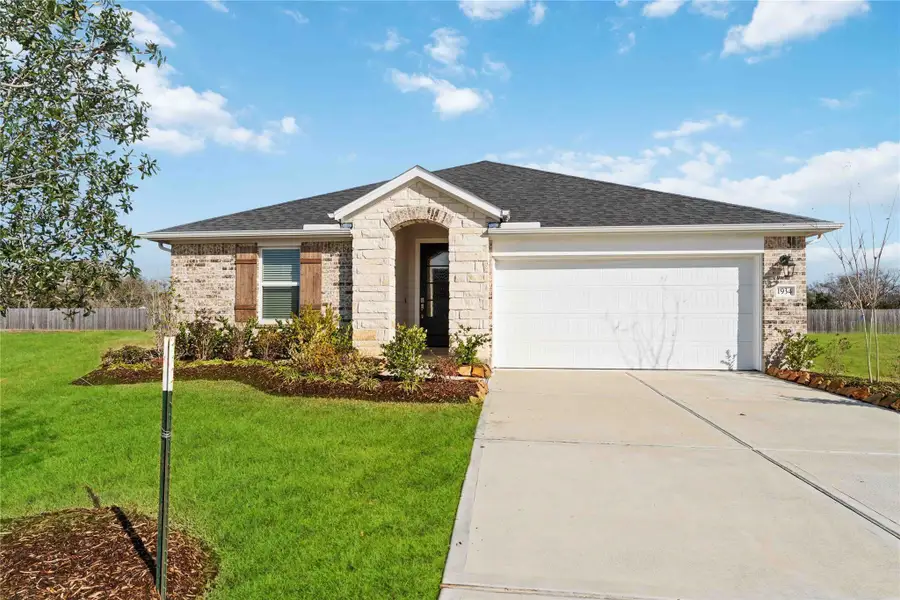 Front exterior of a new home in Sunrise Cove, Texas City, TX, highlighting curb appeal (Image 2).