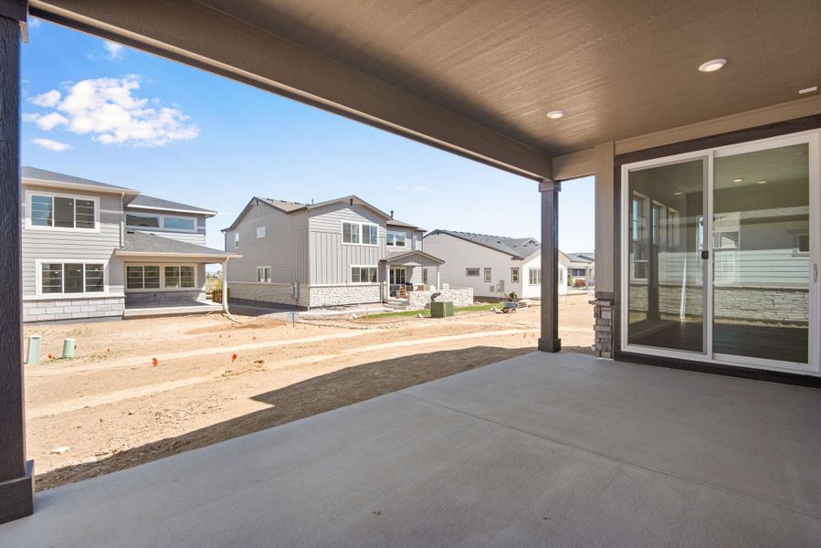 Exterior details and patio area of a home in The Aurora Highlands, Aurora (Image 27).