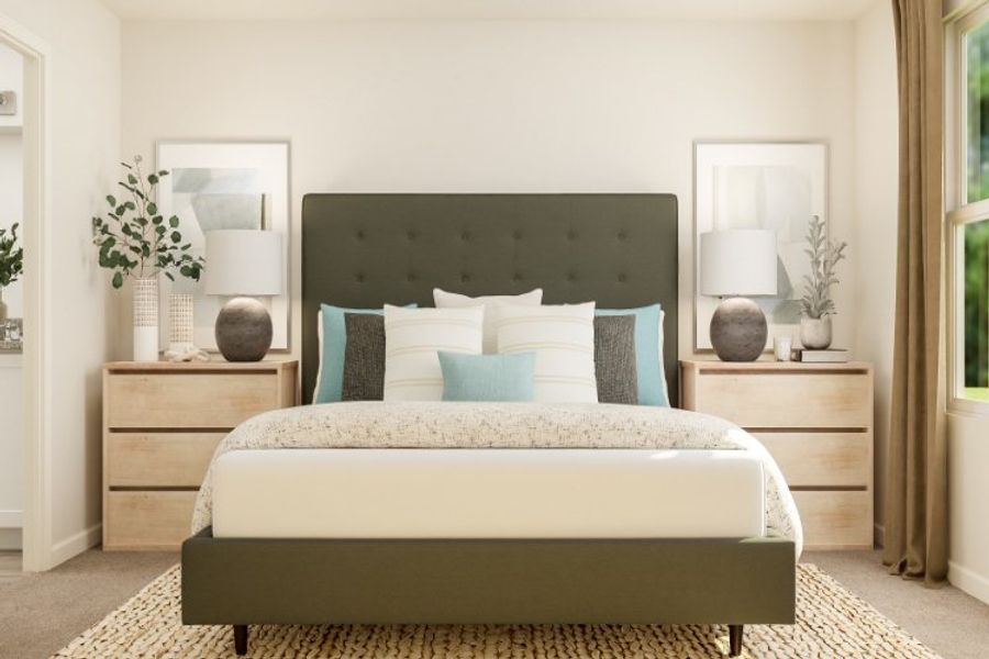 A bed with blue and white pillows. A bed with blue and white pillows.