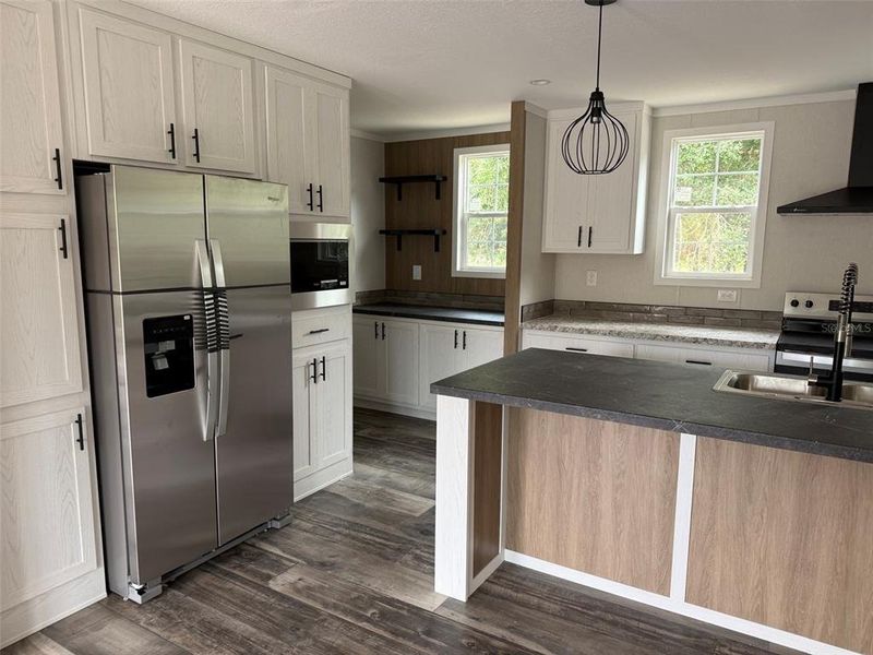 Furnished interior view inside a new home in , Okeechobee (Image 6).