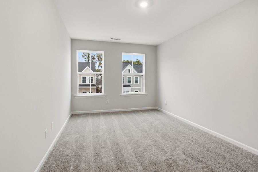 Spacious, unfurnished interior of a new home in Renaissance at White Oak, Garner (Image 30).