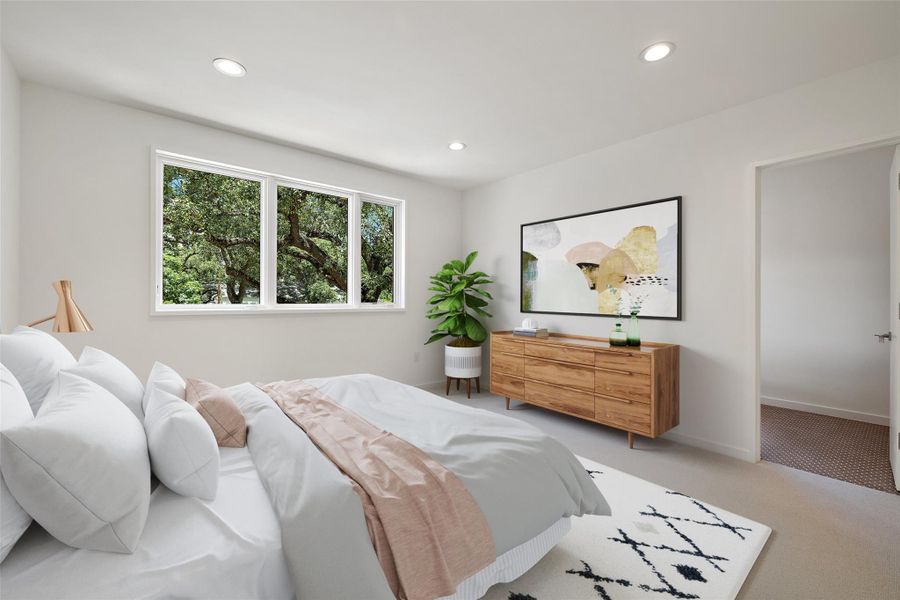 Carpeted bedroom with recessed lighting and baseboards