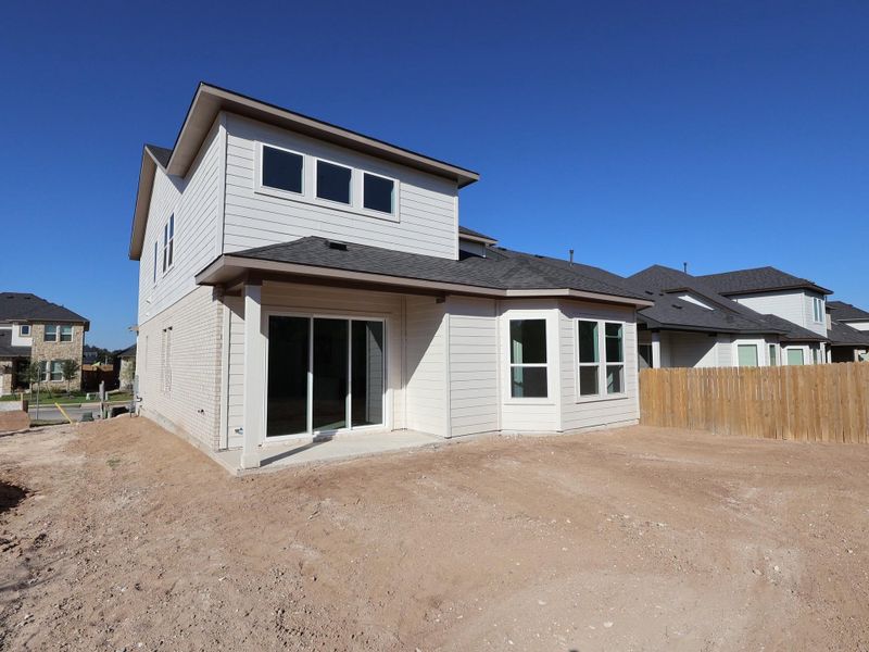 Exterior details and patio area of a home in Cedar Brook, Leander (Image 2). Exterior details and patio area of a home in Cedar Brook, Leander (Image 2).