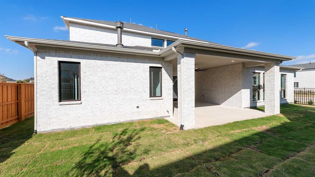 Exterior details and patio area of a home in Fields 60', Frisco (Image 2). Exterior details and patio area of a home in Fields 60', Frisco (Image 2).
