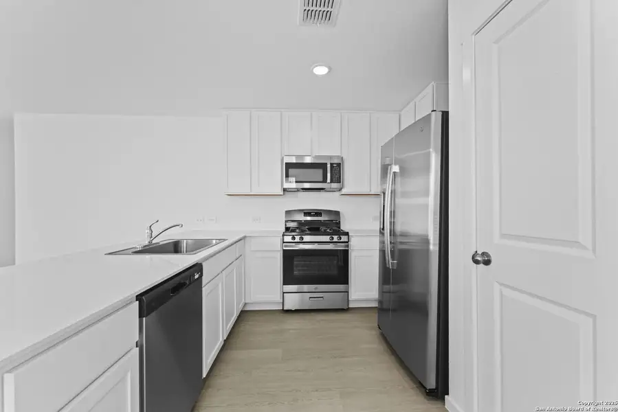 Furnished interior view inside a new home in Torian Village: Belmar Collection, San Antonio (Image 7).