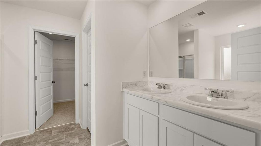 Furnished interior view inside a new home in Oakchase at Hampton, Hampton (Image 9).