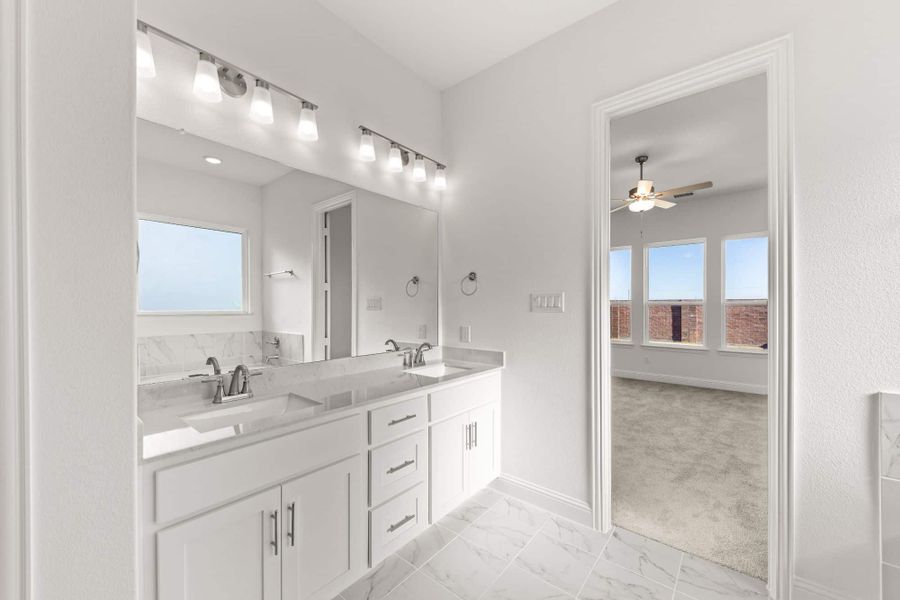 Representative furnished interior of a home built from the Belton by UnionMain Homes in Lake Breeze, Lavon (Image 12).