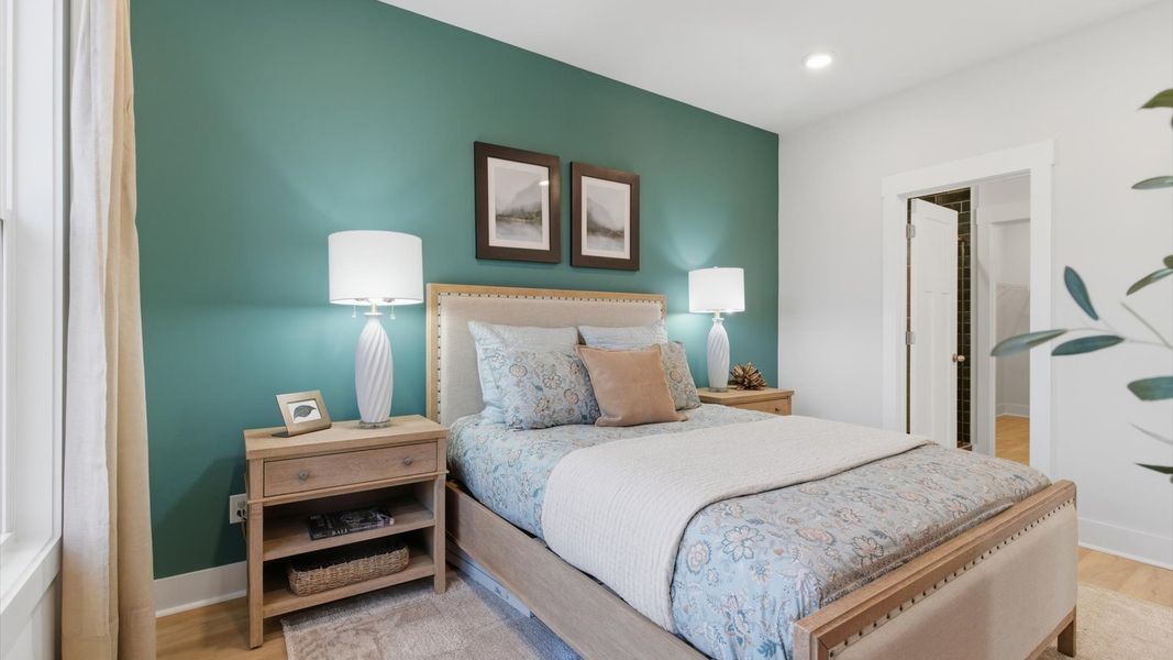 First-class hardwood floors and tasteful finishes elevate the private retreat of this exceptional primary suite in SC