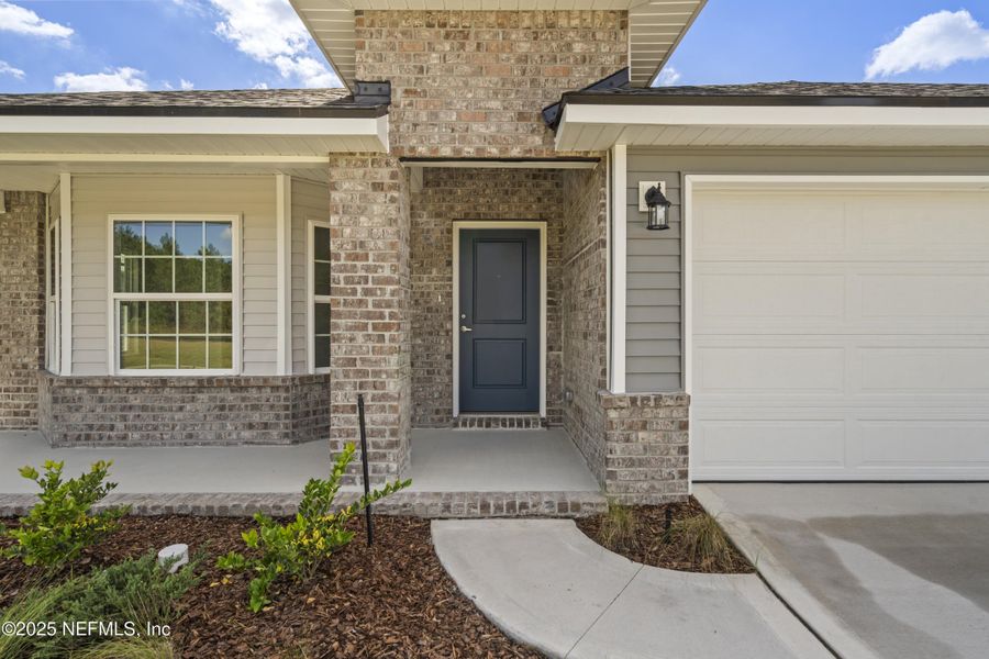 Exterior details and patio area of a home in Summerglen, Jacksonville (Image 24).