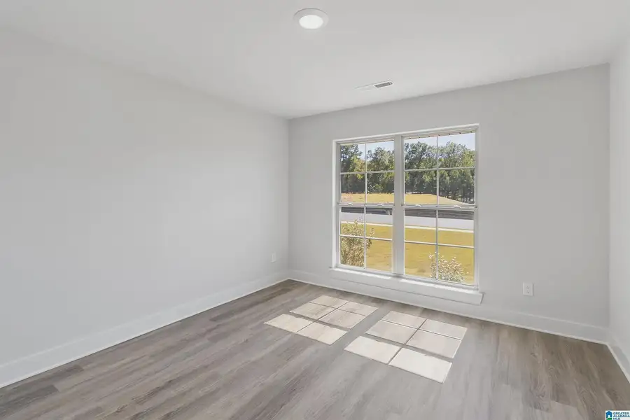 Representative unfurnished interior of a home built from the 3000 by Adams Homes in Hill Country Estates, Dade City (Image 24).