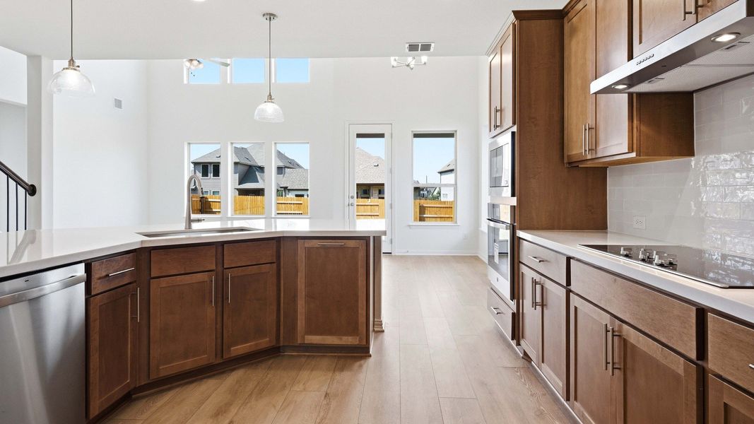 Furnished interior view inside a new home in Oaks at San Gabriel, Georgetown (Image 25).