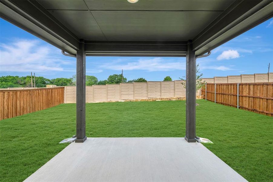 Exterior details and patio area of a home in Aspire at Reunion, Newark (Image 24).