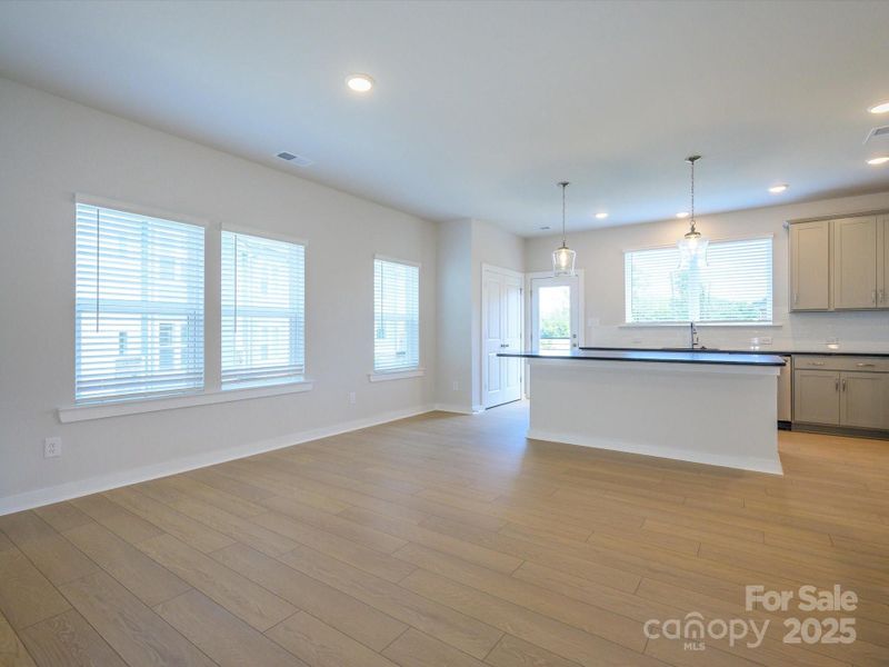 Spacious, unfurnished interior of a new home in Central Living at Craig, Charlotte (Image 27).