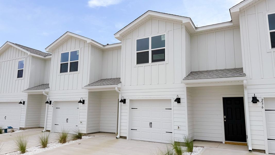 Front exterior of a new home in Salt Creek Townhomes at Mexico Beach, Mexico Beach, FL, highlighting curb appeal (Image 19).