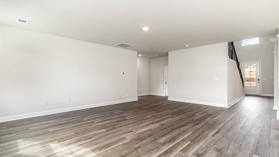 Representative unfurnished interior of a home built from the FORRESTER by D.R. Horton in Haven View, Murrells Inlet (Image 16).