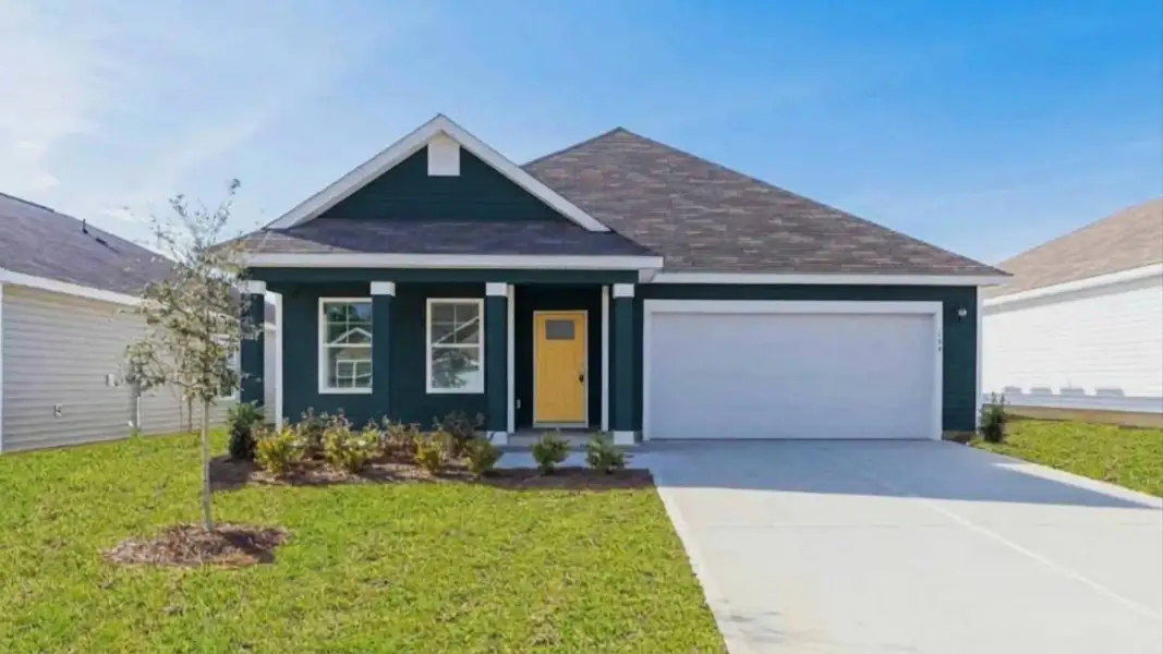 Front exterior of a new home in Merchant Point, Jacksonville, NC, highlighting curb appeal (Image 1). Front exterior of a new home in Merchant Point, Jacksonville, NC, highlighting curb appeal (Image 1).