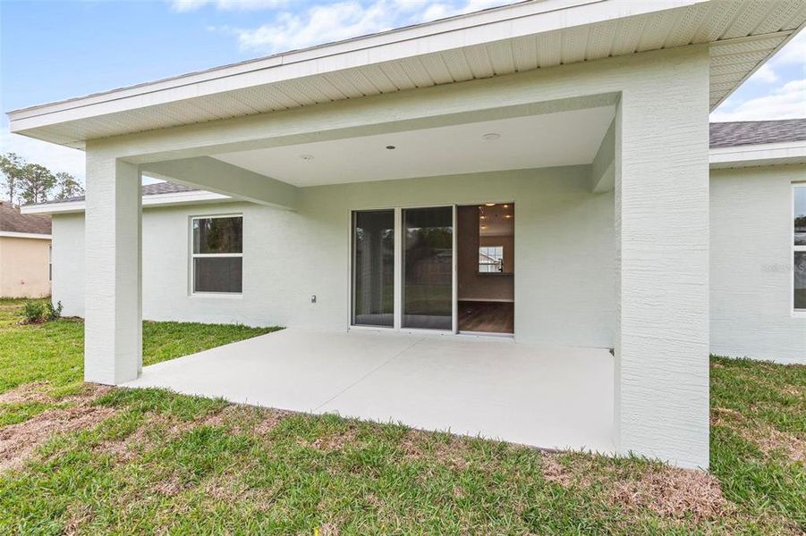 Front exterior of a new home in , Palm Coast, FL, highlighting curb appeal (Image 28).