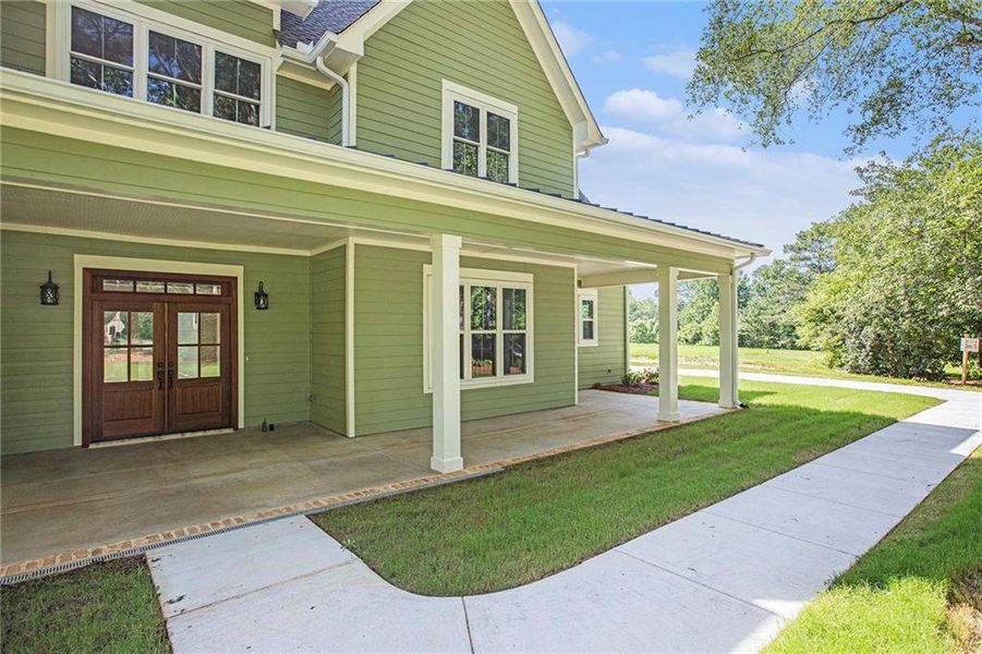 Front exterior of a new home in , Canton, GA, highlighting curb appeal (Image 29). Front exterior of a new home in , Canton, GA, highlighting curb appeal (Image 29).